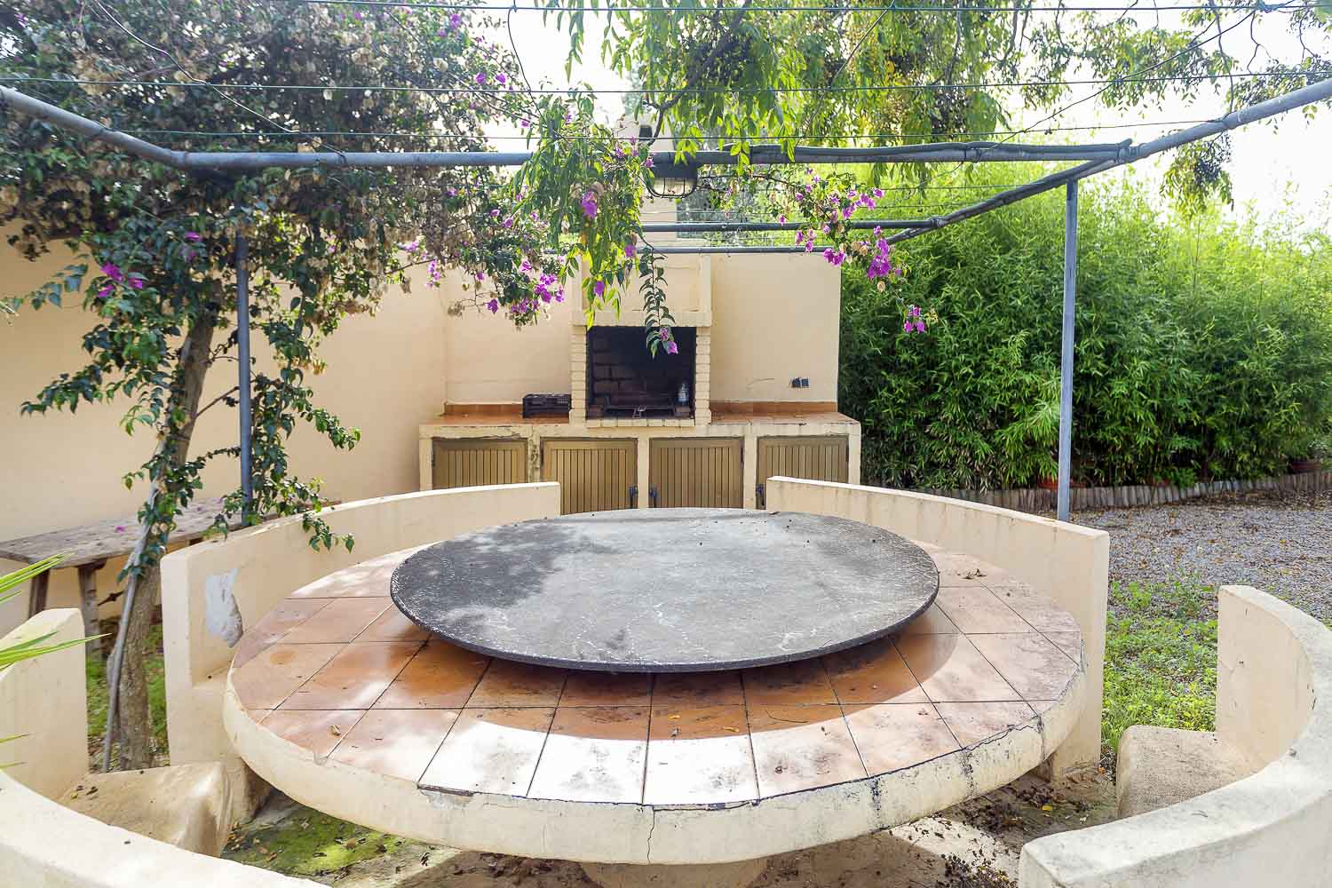 Outside dining-table with barbecue zone